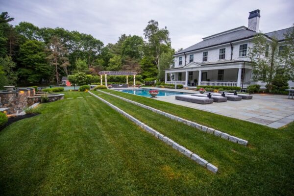 How to Improve Lawn Drainage Naturally: Soil-First Solutions for Soggy Yards